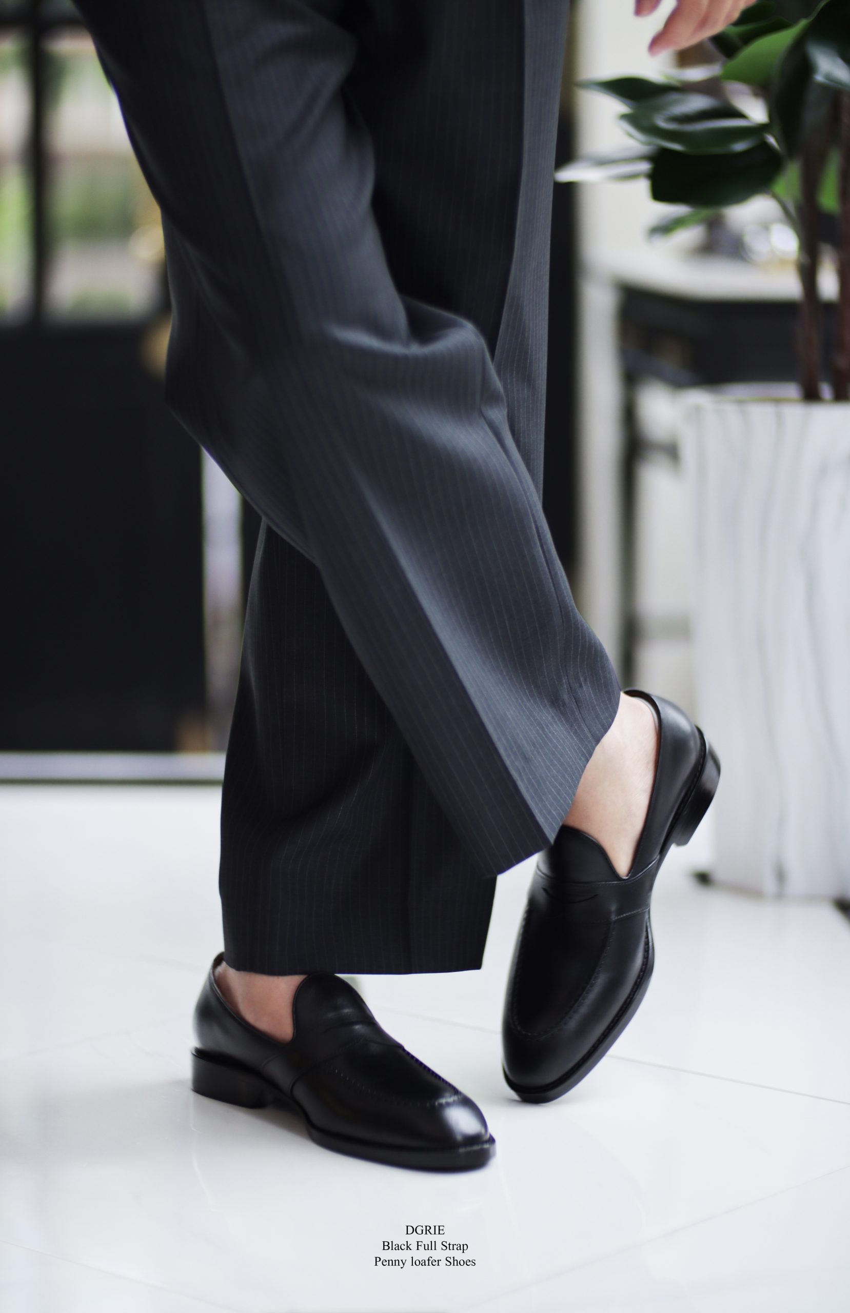 รองเท้าโลฟเฟอร์ DGRIE Black Full Strap Penny loafer by DGRIE