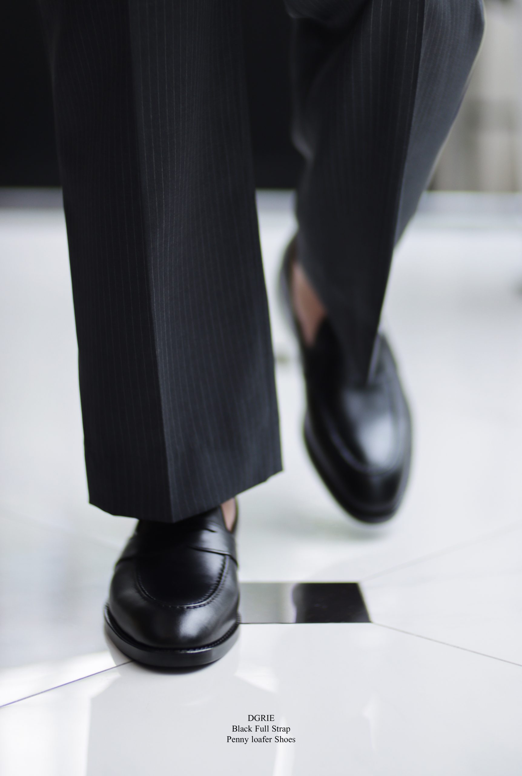 รองเท้าโลฟเฟอร์ DGRIE Black Full Strap Penny loafer by DGRIE