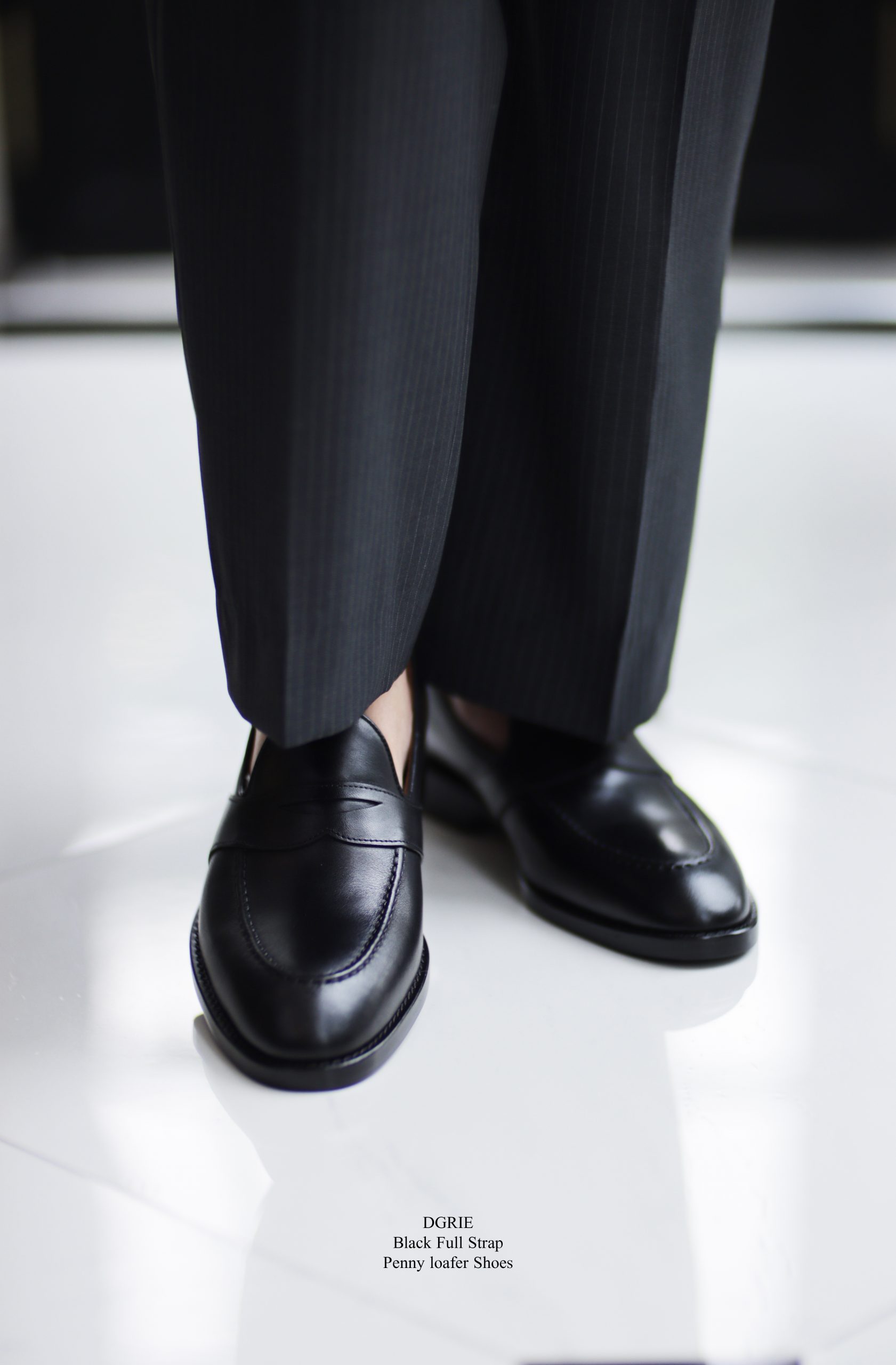 รองเท้าโลฟเฟอร์ DGRIE Black Full Strap Penny loafer by DGRIE