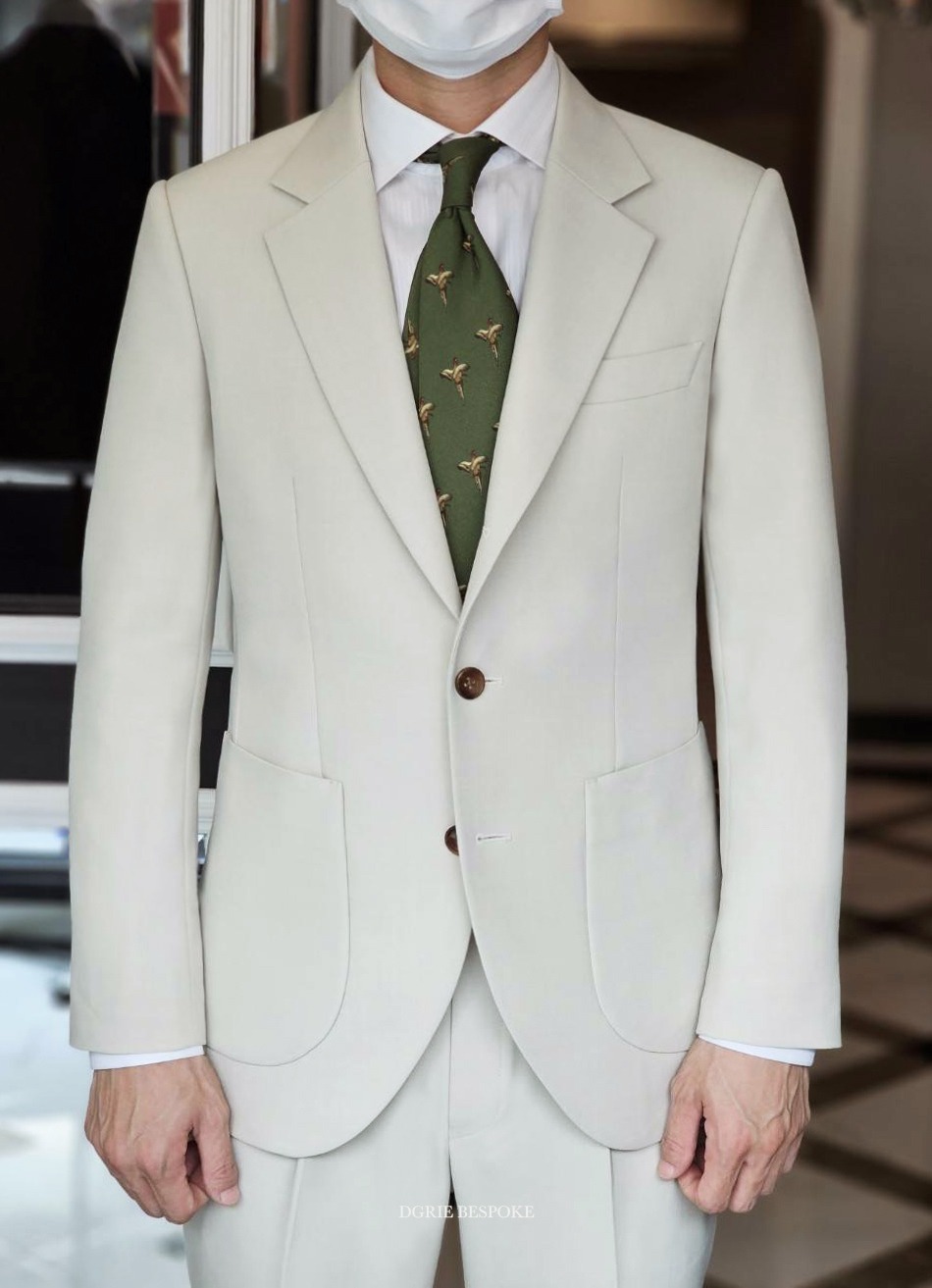 ตัดสูทสีขาวครีม สไตล์ลำลอง DGRIE Ivory White Wool Italy Suits