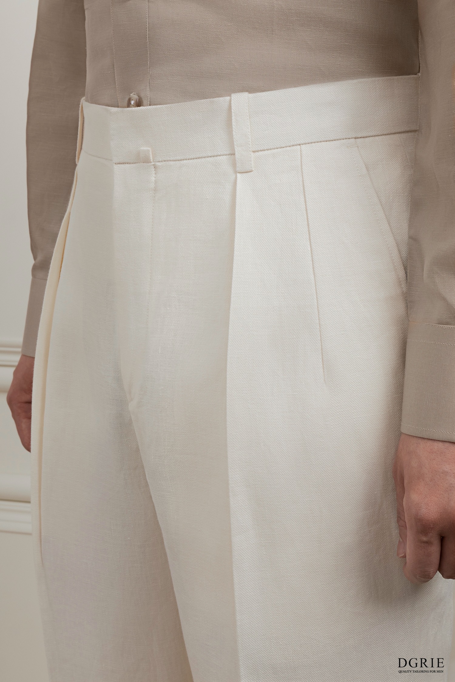 The Alabaster Ivory Pleated Linen Trousers - DGRIE