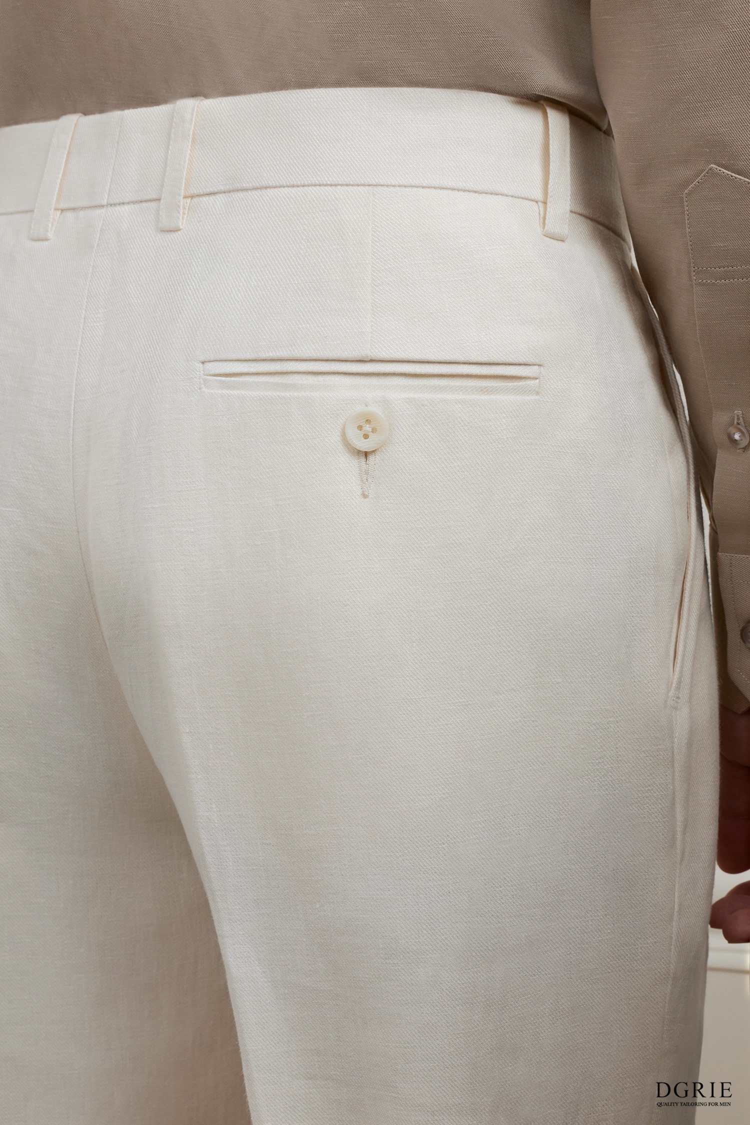 The Alabaster Ivory Pleated Linen Trousers - DGRIE