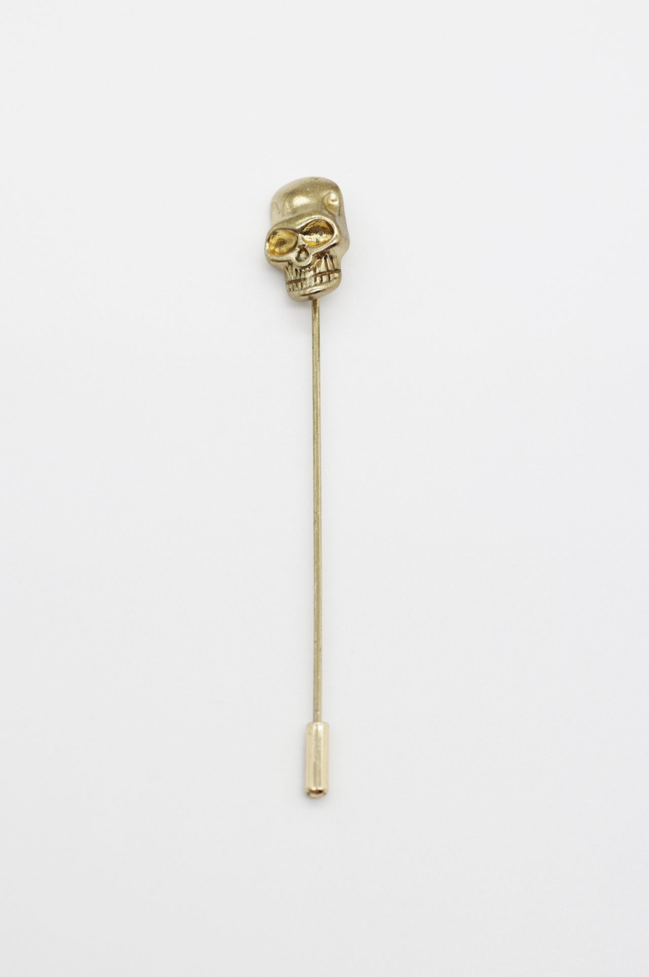 gold skull lapel pin dgrie